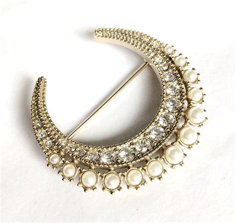 chanel moon brooch|Chanel crystal brooches.